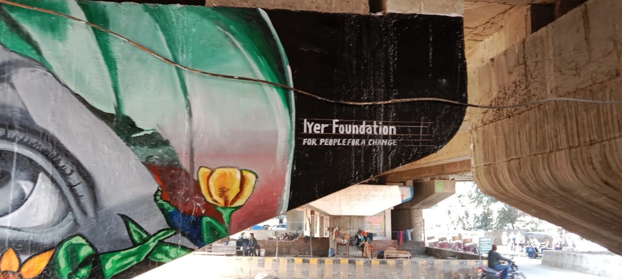 Iyer Foundation street mural under a flyover — For People For A Change