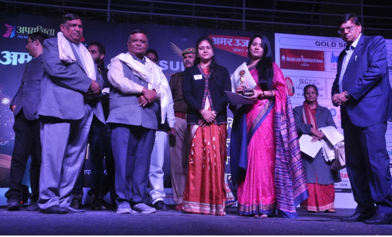 Award ceremony on stage — Iyer Foundation recognised for its work