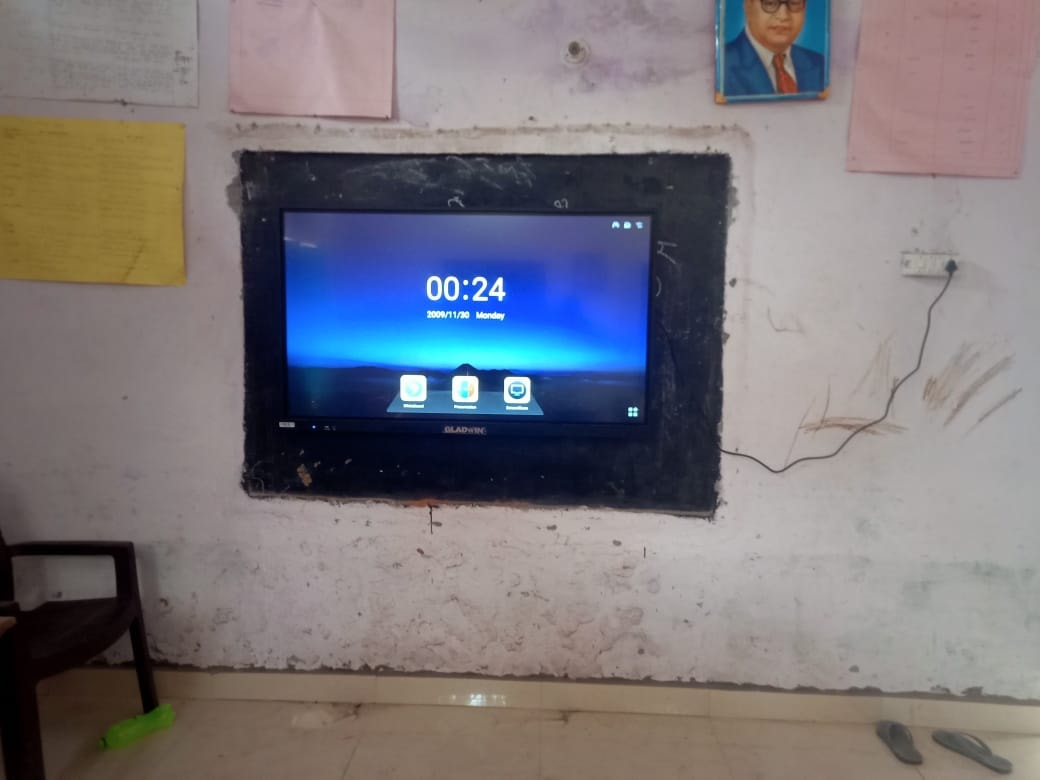 Gladwin smart board mounted on classroom wall at Primary Vidyalaya Charora